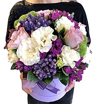 Purple Colored Flowers in The Box